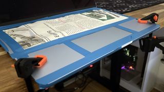 A MacBook ready to have its sharp leading edge filed down.