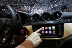 Apple Inc.'s CarPlay system is seen in the touchscreen console of a Ferrari FF automobile in 2014