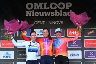 NINOVE BELGIUM FEBRUARY 25 LR Lorena Wiebes of The Netherlands and Team SD Worx on second place race winner Lotte Kopecky of Belgium and Team SD Worx and Marta Bastianelli of Italy and UAE Team ADQ on third place pose on the podium ceremony after the 18th Omloop Het Nieuwsblad Elite 2023 Womens Elite a 1322km one day race from Ghent to Ninove OHN23 on February 25 2023 in Ghent Belgium Photo by David StockmanGetty Images