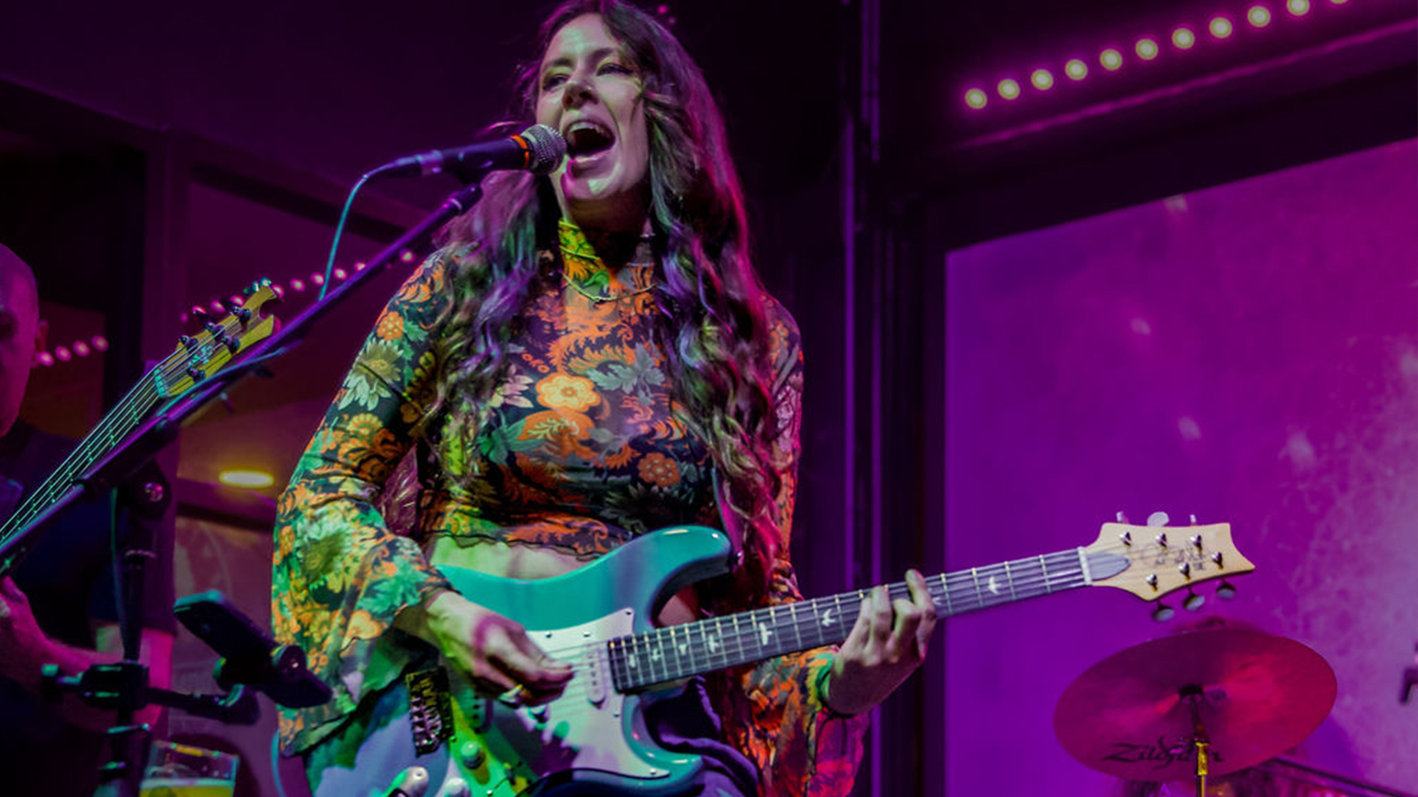 Press photos of Magnolia Boulevard performing live with PRS guitars