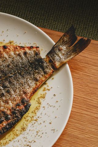 Grilled branzino with artichoke tapenade