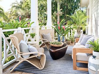 Tropical-inspired backyard porch area