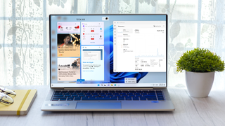 Windows 11 desktop with widgets panel