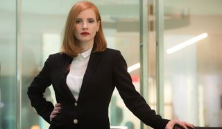 Jessica Chastain stands authoritatively in an office in Miss Sloane.