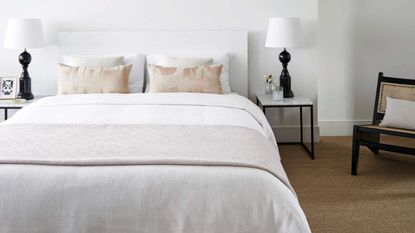 White bed sheets in minimalist bedroom