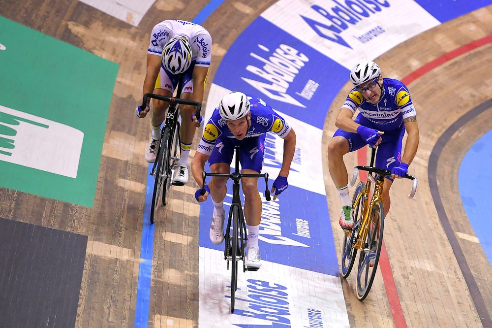Elia Viviani slings Iljo Keisse toward the final sprint of the final Madison at the Gent Six Day