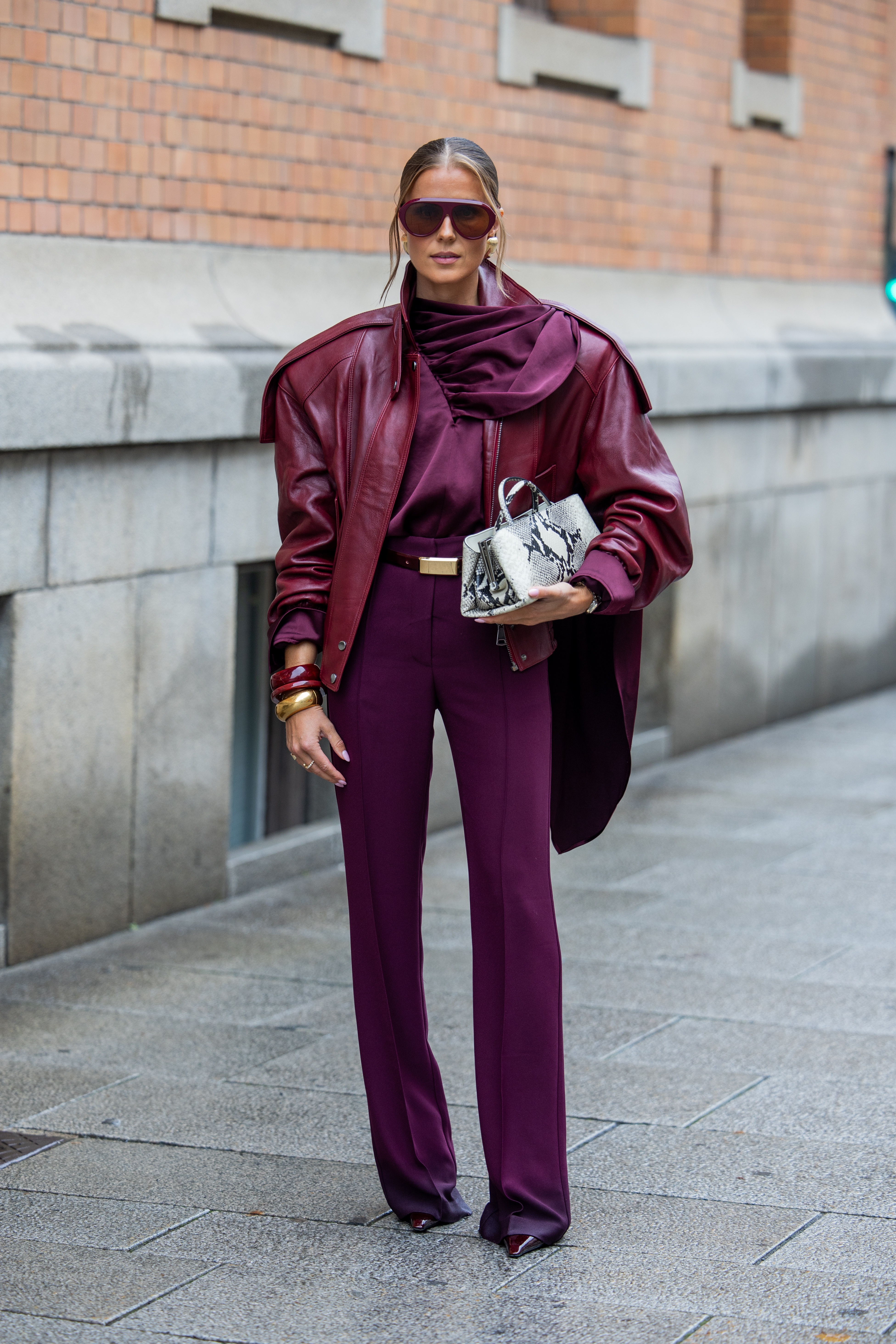 Woman in plum outfit