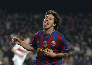 Lionel Messi sticks his tongue out as he celebrates after scoring for Barcelona against Stuttgart in the Champions League in 2010.
