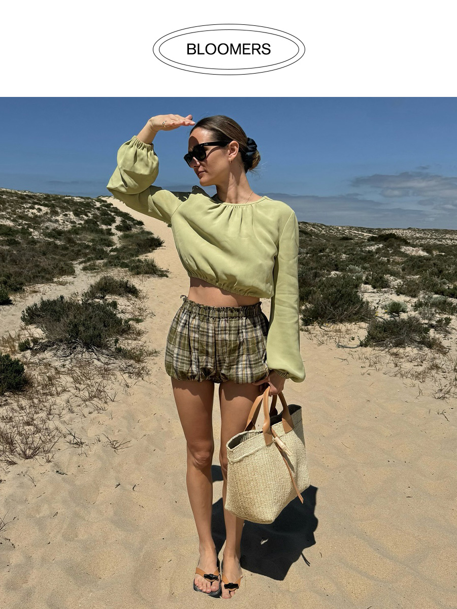 Influencer wearing plaid bloomer shorts