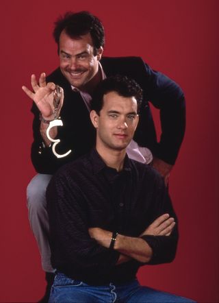 Tom Hanks with Dan Aykroyd in a photo shoot for Dragnet 1987