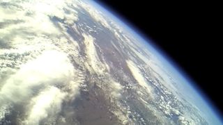 View of Earth above Spaceport America from Armadillo Aerospace's STIG A rocket flight at apogee (highest point) on Dec. 4, 2011.