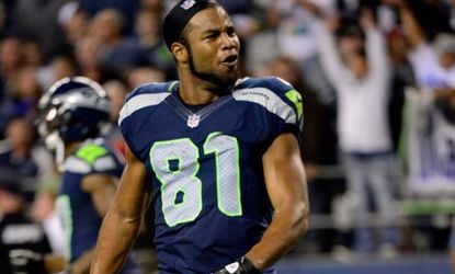 Seattle Seahawks wide receiver Golden Tate celebrates his winning touchdown after a controversial call made by the NFL's less-than-stellar replacement refs.