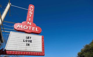 The Austin Motel sign board