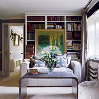 living room with book shelves and sofa