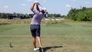 Jon Rahm takes a tee shot at LIV Golf Houston