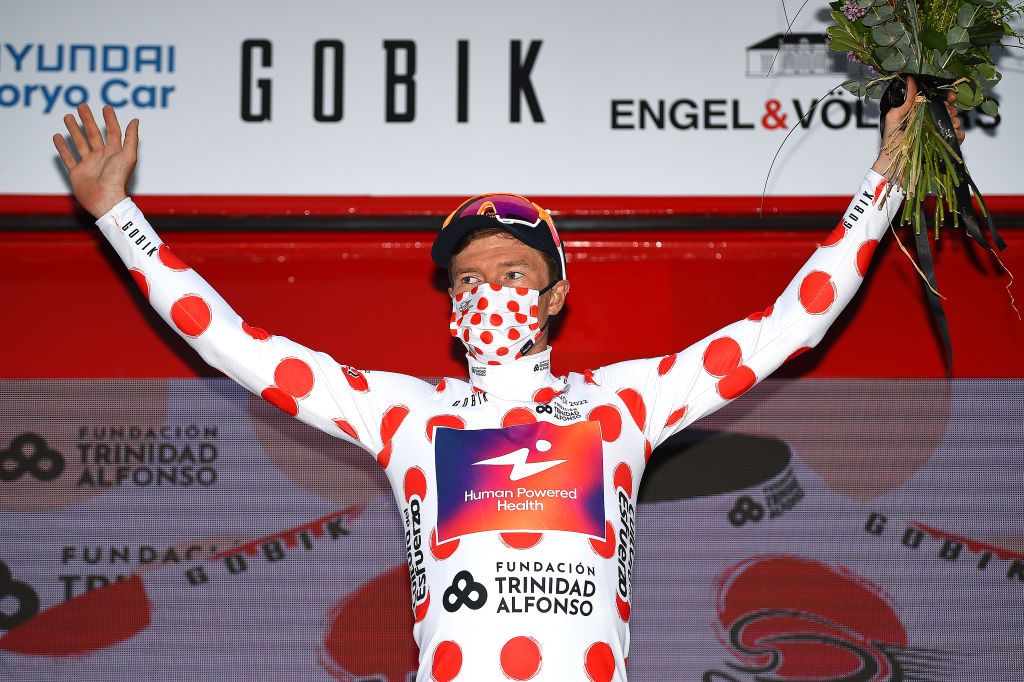 TORREVIEJA SPAIN FEBRUARY 05 Benjamin King of United States and Team Human Powered Health celebrates winning the polka dot mountain jersey on the podium ceremony after the 73rd Volta A La Comunitat Valenciana 2022 Stage 4 a 1931km stage from Orihuela to Torrevieja VCV2022 on February 05 2022 in Torrevieja Spain Photo by Dario BelingheriGetty Images