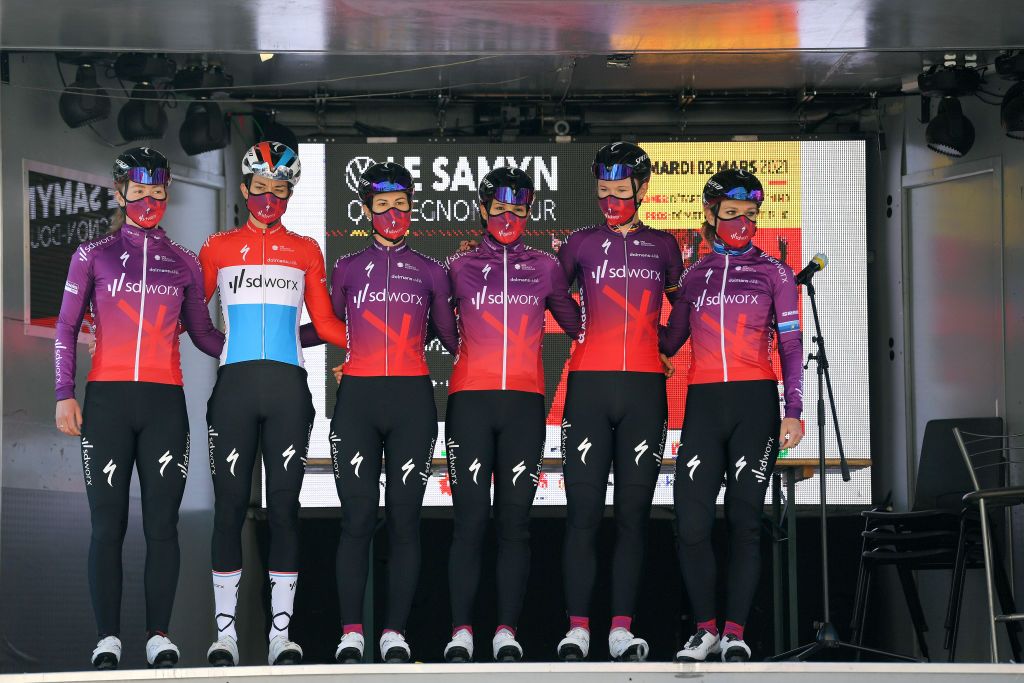 DOUR BELGIUM MARCH 02 Start Jolien Dhoore of Belgium Lonneke Uneken of The Netherlands Christine Majerus of Luxembourg Amy Pieters of The Netherlands Elena Cecchini of Italy Roxane Fournier of France and Team SD Worx during the 10th Le Samyn des Dames 2021 Womens Elite a 925km race from Quaregnon to Dour Mask Covid safety measures Team Presentation GPSamyn on March 02 2021 in Dour Belgium Photo by Luc ClaessenGetty Images