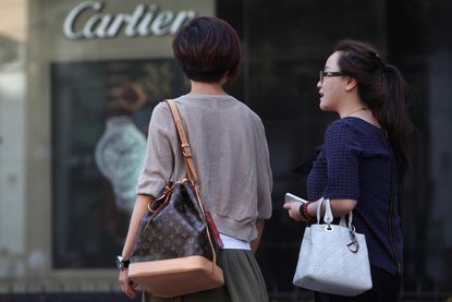 Nearly half of China's wealthy want to leave China
