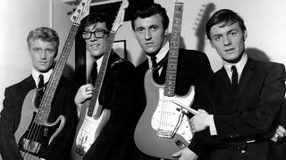 The Shadows; L to R: Jet Harris, Hank Marvin, Bruce Welch, Tony Meehan, posed, group shot, backstage, c.1960/1961