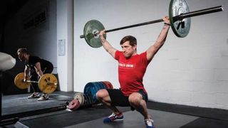 Nick Hutchings performing the overhead squat