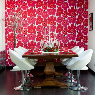 dining room with red floral wallpaper
