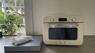 Smeg 10-in-1 Countertop Oven unboxed on the counter