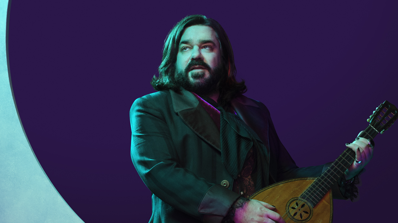 Lazslo playing mandolin on the moon in What We Do In The Shadows 