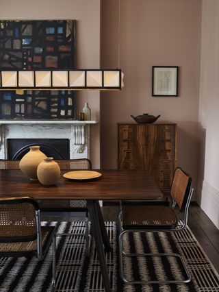 A dining room with light fixture