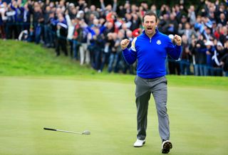 Graeme McDowell celebrates holing the winning putt at the 2010 Ryder Cup