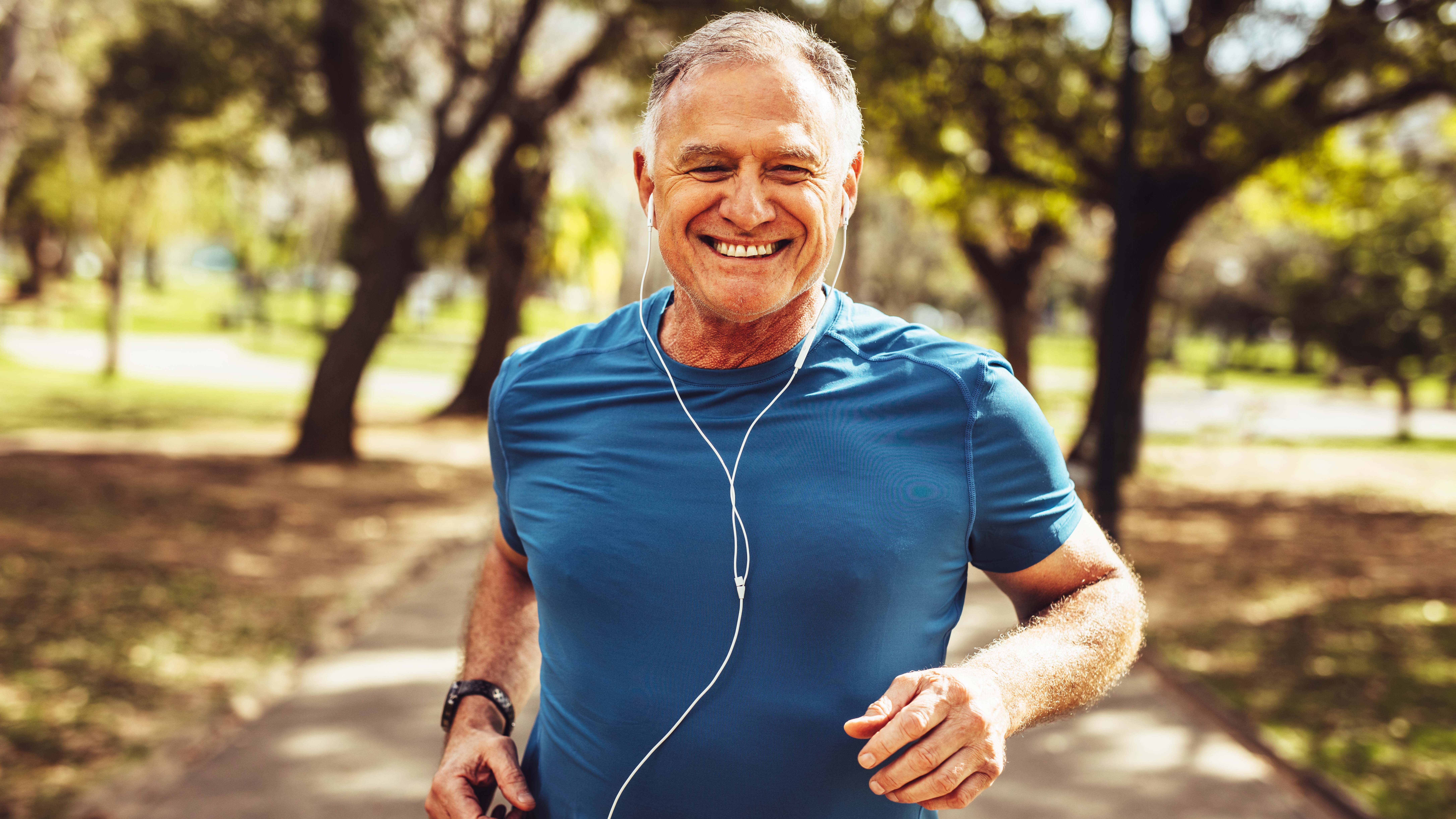 a photo of a senior man running