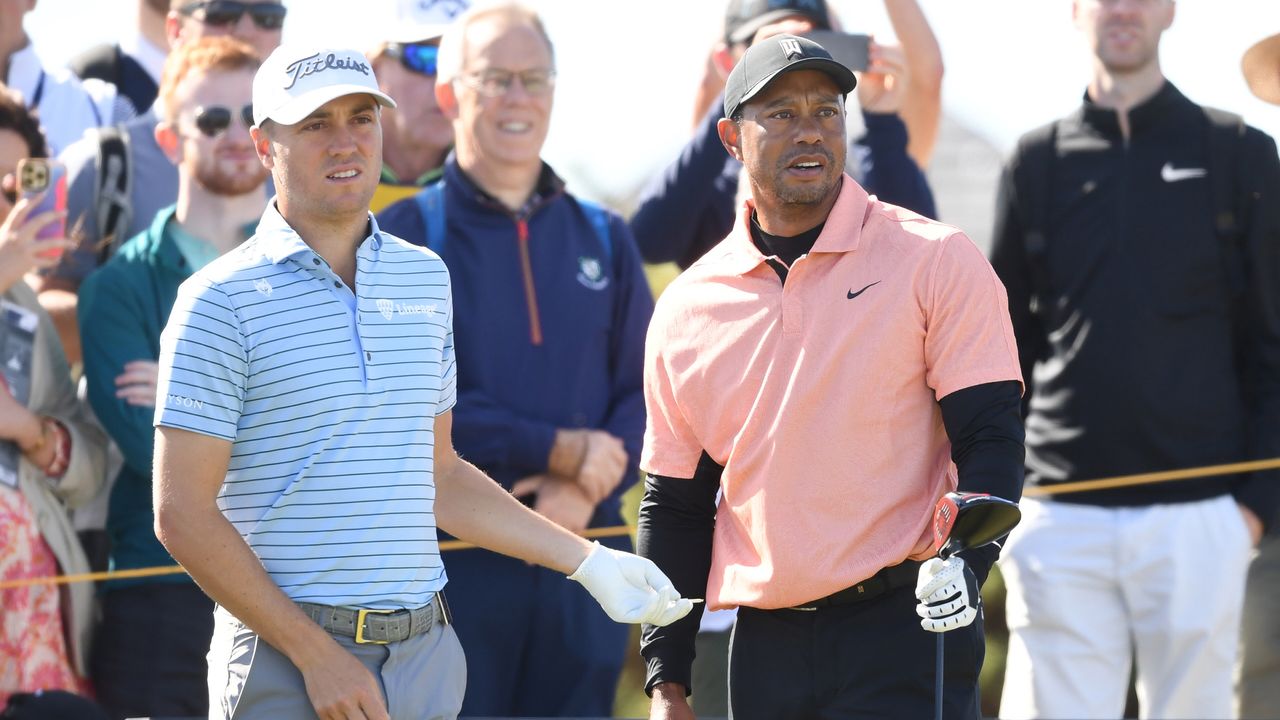 Justin Thomas and Tiger Woods during a practice round for the 150th Open at St Andrews