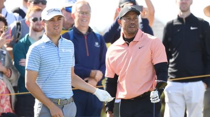 Justin Thomas and Tiger Woods during a practice round for the 150th Open at St Andrews