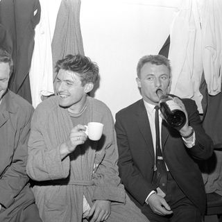 Tommy Docherty celebrates Chelsea's return to Division One