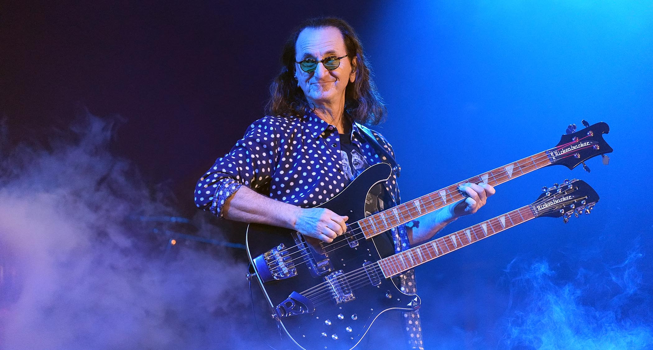 Geddy Lee performs with his double-neck Rickenbacker