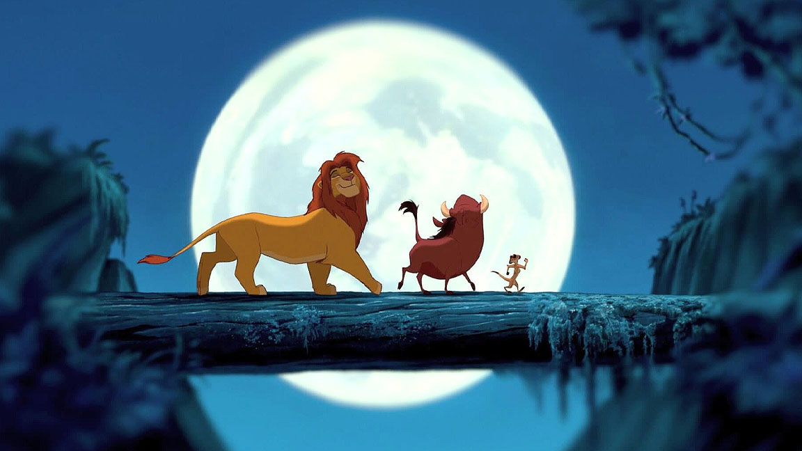 Best animated movies of the 90s; a lion and other animals walk across a fallen tree in front of a full moon
