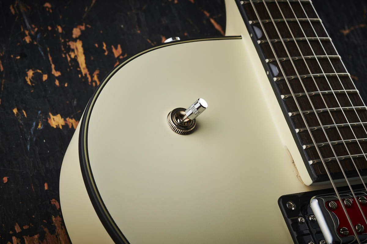 The three-way pickup selector is parked on the shoulder.