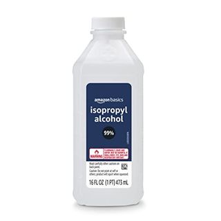 A white plastic bottle of isopropyl alcohol with a white screw lid and a blue label