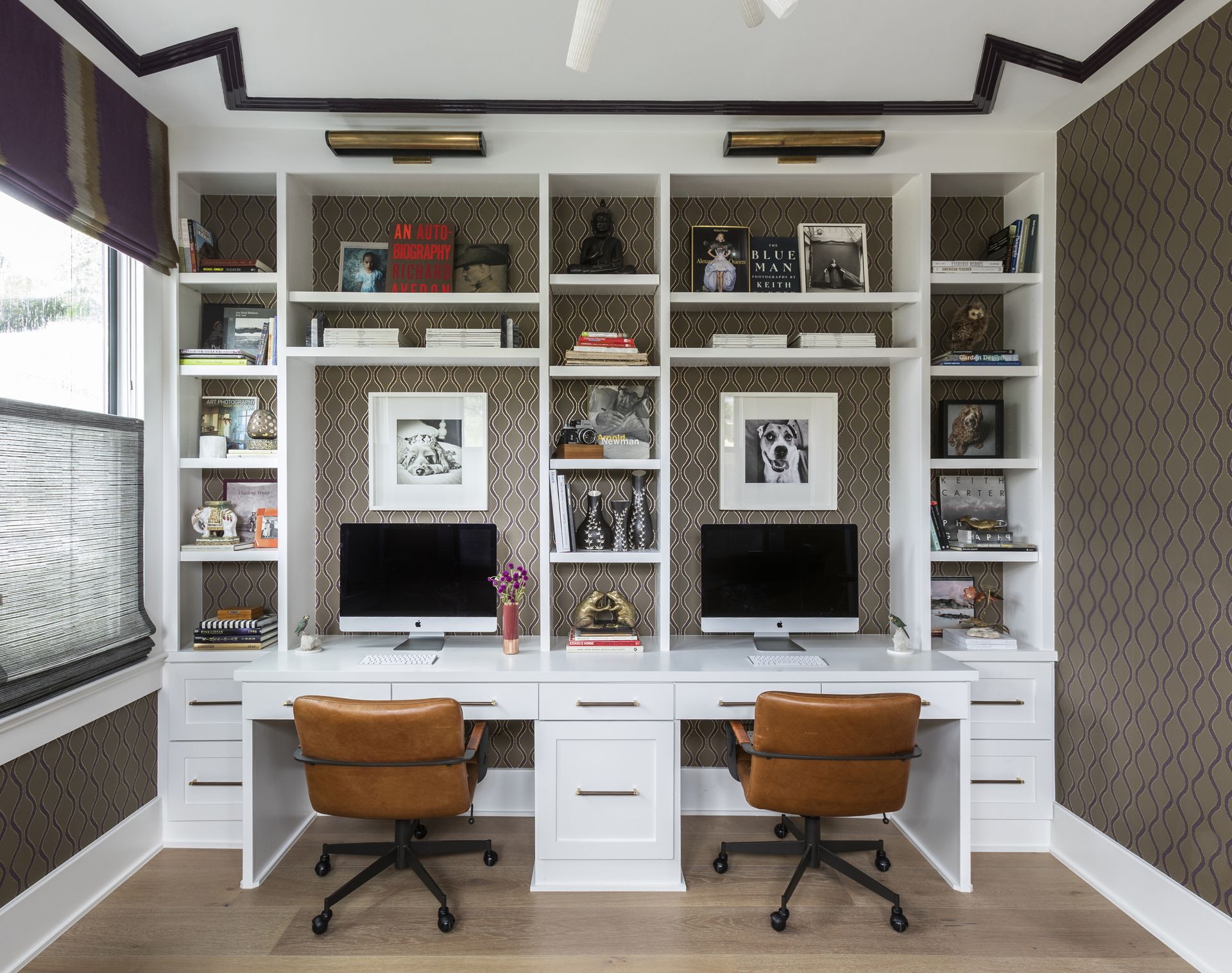 Home office with double built in desk with shelving in white above