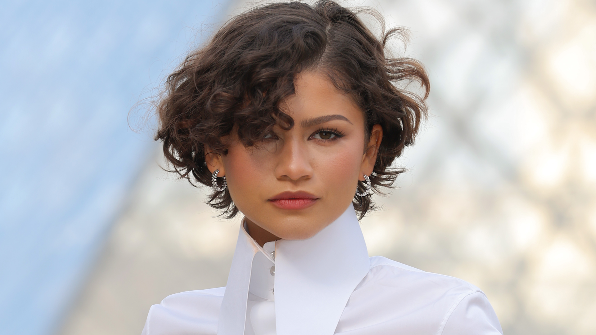 Zendaya attended the Louis Vuitton Fall 2026 fashion show in a white bubble-hem skirt set