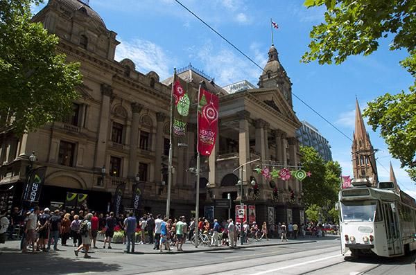 An iconic Melbourne tram passes by the GreenEdge function at the Town Hall.
