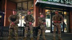 National Guard troops stand guard outside a Shake Shack in Washington, D.C.