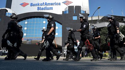 Police deploy to the Bank of America stadium in Charlotte