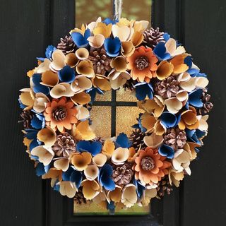 An unusual orange and blue autumn wreath
