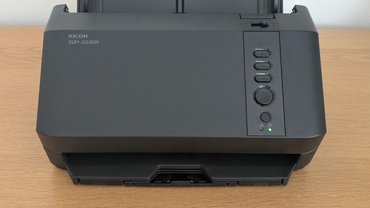 The Ricoh SP-2230N on a desk
