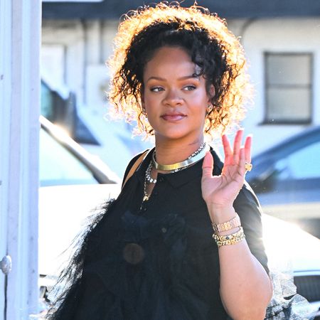 A pregnant Rihanna wore track pants with cleated sneakers