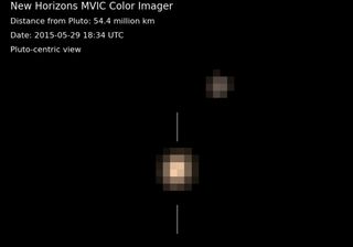 This color view of Pluto and its largest moon Charon show the pair in a Pluto-centric view as seen by NASA's New Horizons spacecraft during one of nine observations between May 29 and June 3, 2015. New Horizons will fly close by Pluto on July 14.