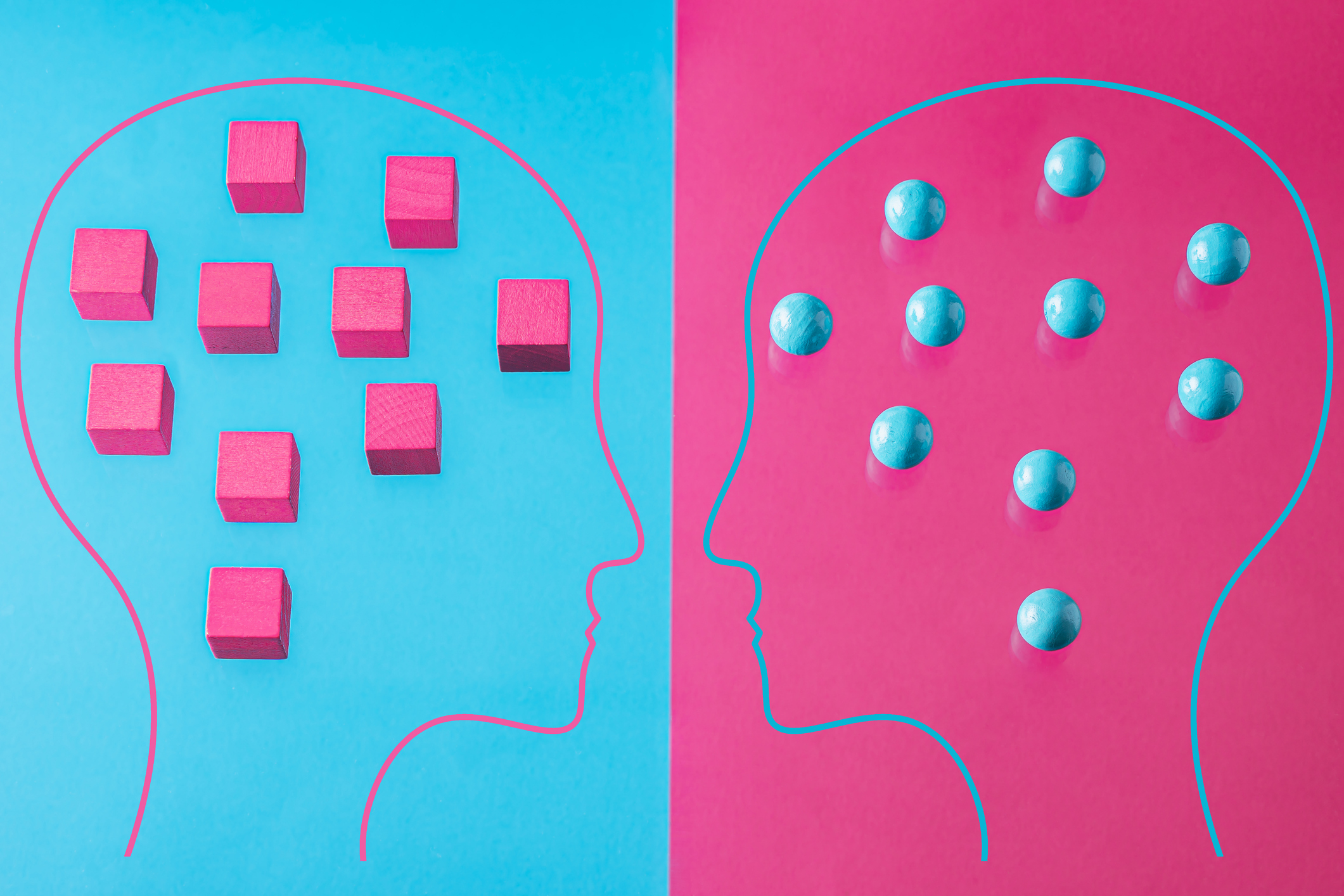 The concept of rational and irrational thinking of two people. Heads of two people with colourful shapes of abstract brain for concept of idea and teamwork. Two people with different thinking