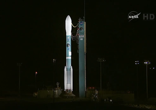 NASA's Soil Moisture Active Passive mission (SMAP) sits atop this United Launch Alliance Delta II rocket at Vandenberg Air Force Base in California before launch on Jan. 29, 2015.
