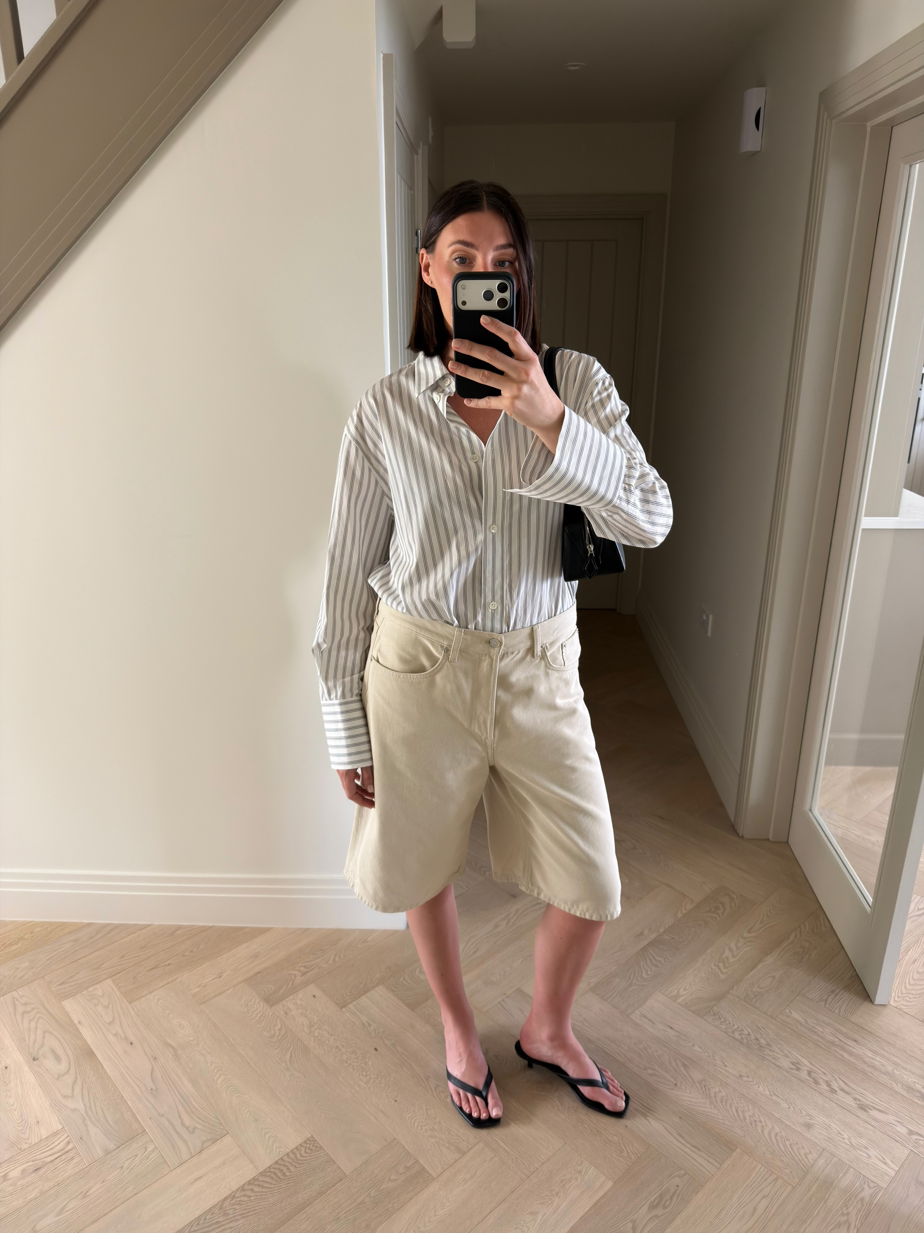 Sarah louise blythe wearing COS shorts
