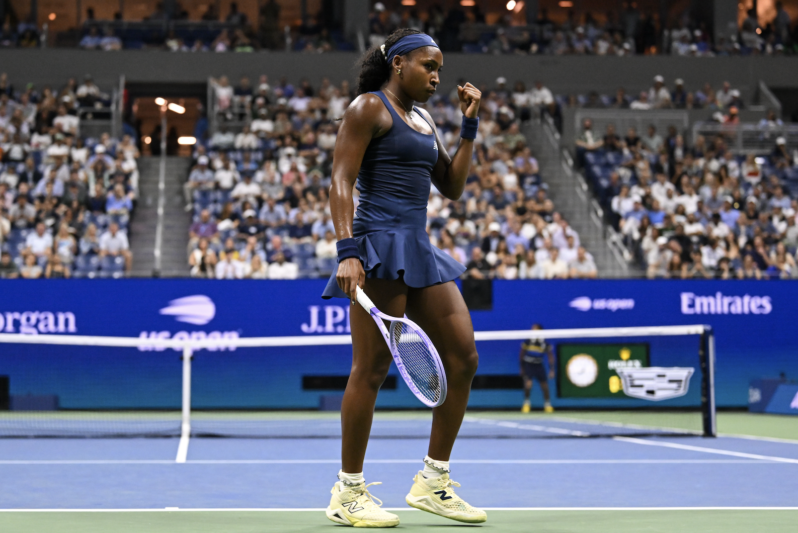 Coco Gauff's custom New Balance outfit at the 2026 US Open featured the navy blue and butter yellow color combination
